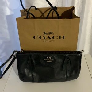 (SOLD) Coach black leather minimum wristlet